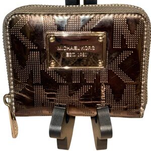 MICHAEL KORS WALLET METALLIC GUNMETAL 4 1/2” L x 3 1/2” H FEW SCRATCHES ON PLATE